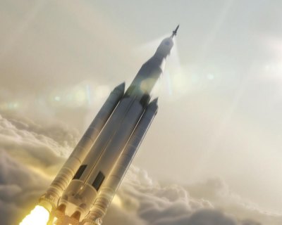 A powerful space launch system will be tested as NASA plots steps toward its journey to Mars.  Artist's concept: NASA.
